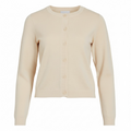 Detalle botones beige chaqueta básica mujer