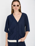 Chaqueta de cuello pico con detalles metalizados y manga caída skatie