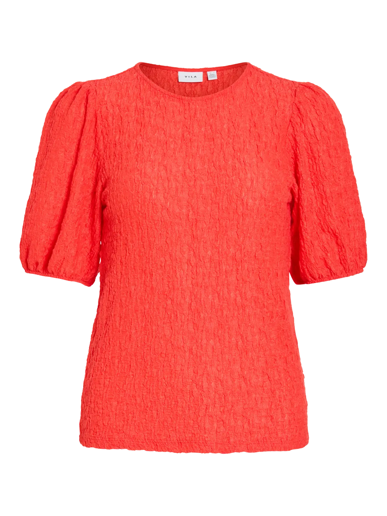 Camiseta Vila coral de manga corta abullonada con textura uniforme en todo el tejido y cuello redondo. Diseño limpio sin estampados, protagonista por su color vibrante y volumen en hombros.
