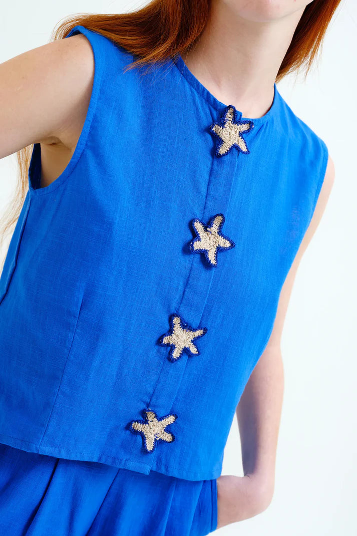 Top básico elevado mujer estrellas de mar a modo botones de ganchillo