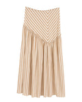 Falda midi de rayas beige y blanco.