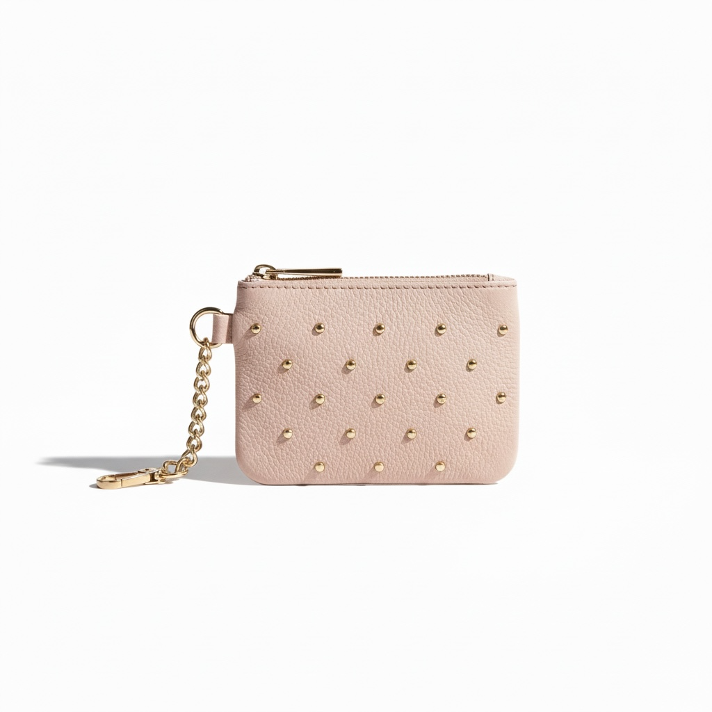 monedero piel natural con tachuelas en color rosa empolvado