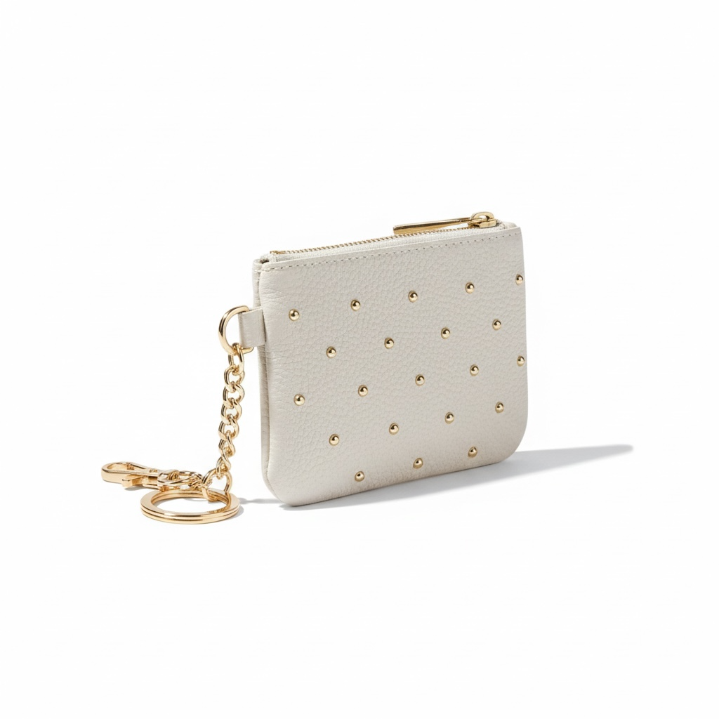 monedero piel natural con tachuelas en color beige
