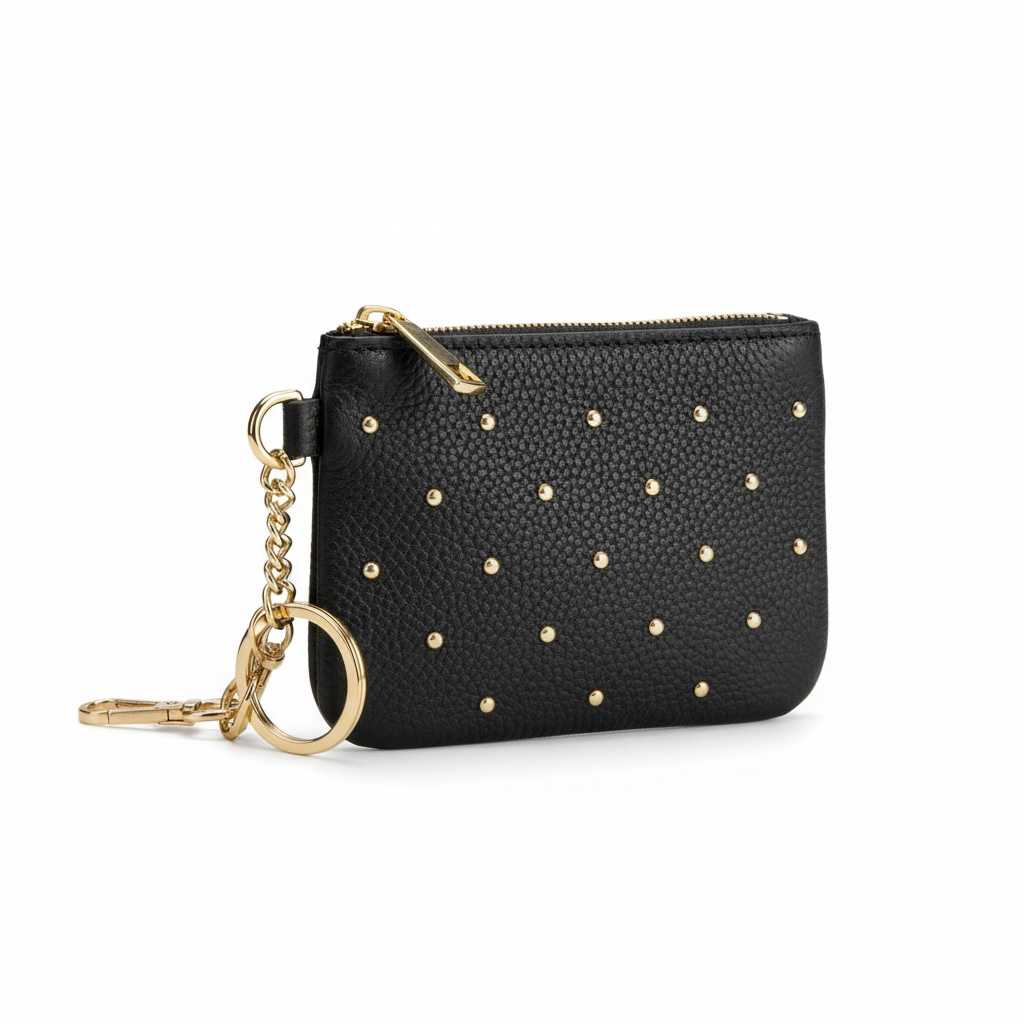 monedero piel natural con tachuelas en color negro