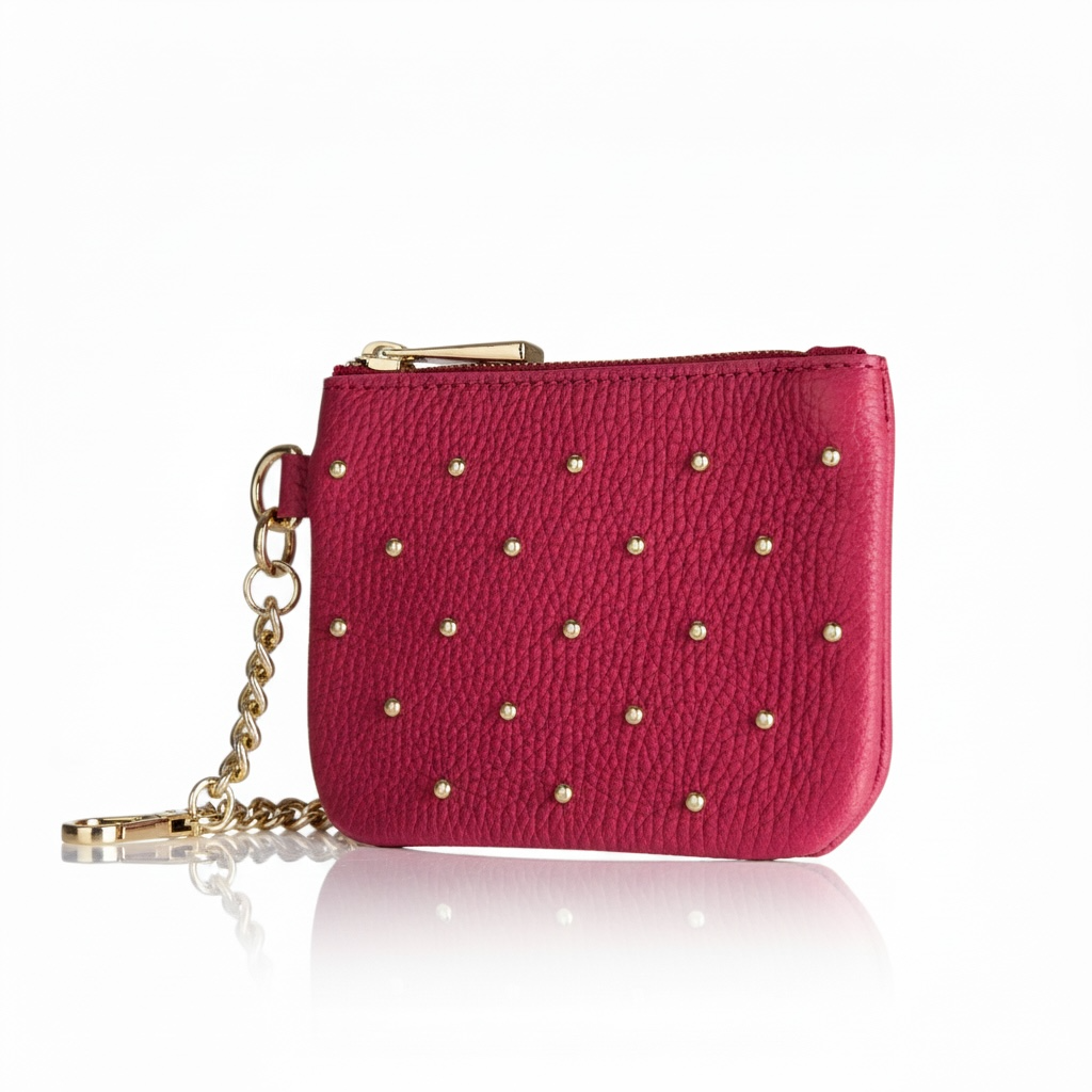 monedero piel natural con tachuelas en color rojo 
