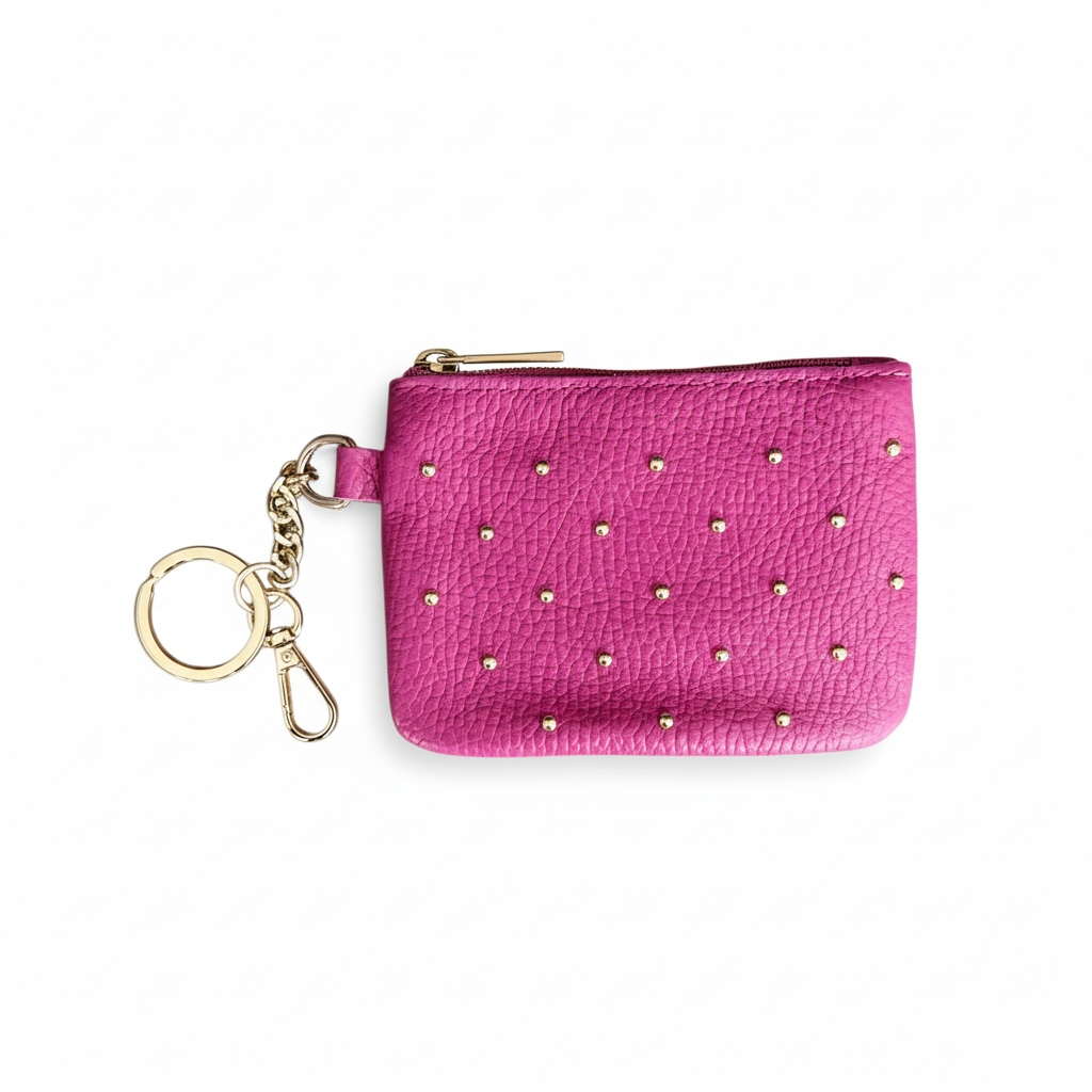 monedero piel natural con tachuelas en color rosa