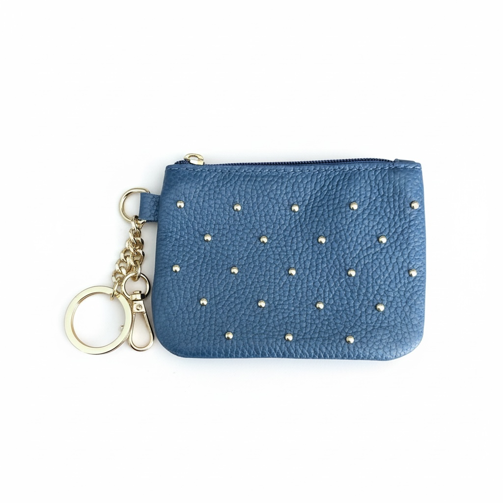 monedero piel natural con tachuelas en color azul