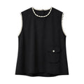 Top Colette negro sin mangas con ribete en contraste y bolsillo decorativo.